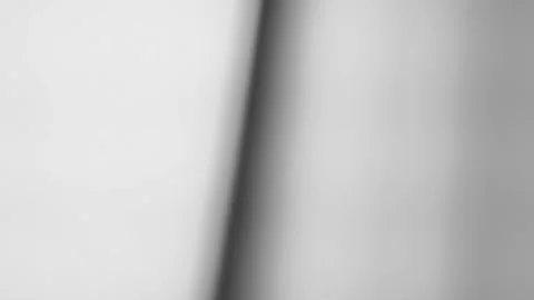 A clean, minimalist backdrop for a blank sheet Stock Footage 314209106