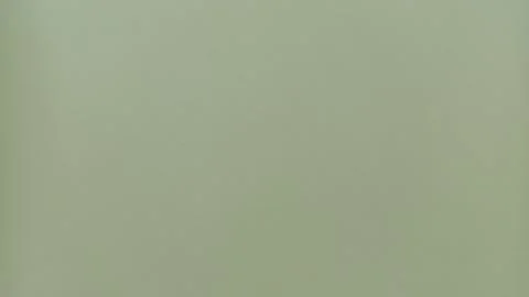 A clean minimalist background featuring a solid olive green pastel color Ilustração Stock