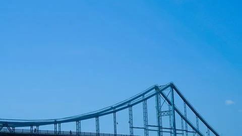 Clean minimalist pedestrian bridge underside captured from below with abstrac Stock Photos