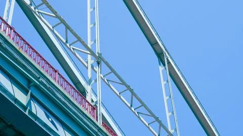 Clean minimalist pedestrian bridge underside captured from below with abstrac Stock Photos