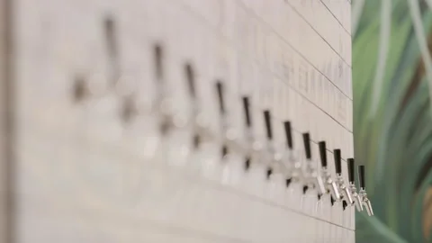 Clean modern bar taps in bar. Close up on 4k RED camera. Video stock 199456005