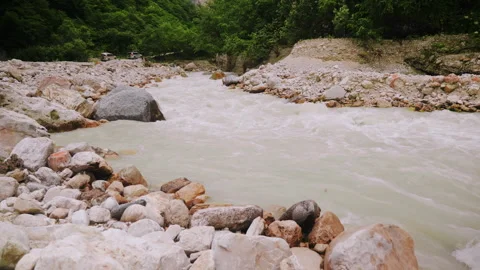 Clean Mountain Stream Waters Flowing Around White Boulder Rocks On River Bank Видео 346116849