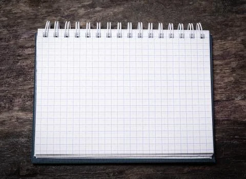 Clean notebook on a wooden table Stock Photos
