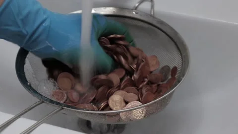 Clean old coins in solution. coins of the ussr Stock Footage 130768406