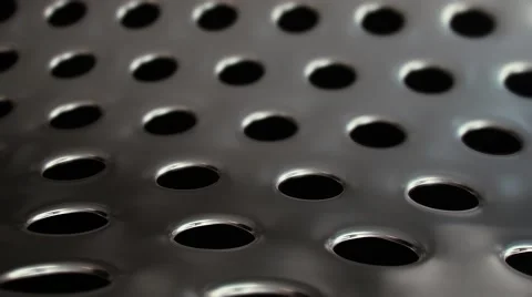 Clean Perforated Metal with Blinking Reflections v2 库存影片 59592659