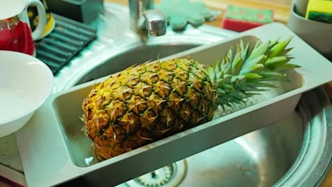 Clean Pineapple Air Drying After Washing In Home Kitchen Close Up Stock Footage 341393247