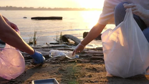 Clean up plastic on the beach. Plastic pollution and environmental problem Stock Footage 158153612