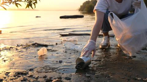 Clean up plastic on the beach. Plastic pollution and environmental problem Stock Photos