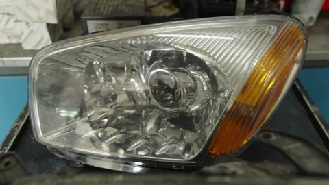 A clean, polished car headlight after a professional restoration process Stock Footage 340154915