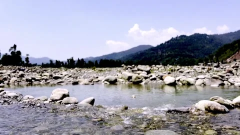 Clean River Water Flowing Through Pristine Natural Landscape Видео 339531358