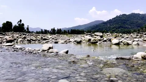 Clean River Water Flowing Through Pristine Natural Landscape 動画素材 339531438