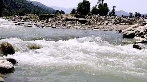 Clean River Water Flowing Through Pristine Natural Landscape Видео 339531736