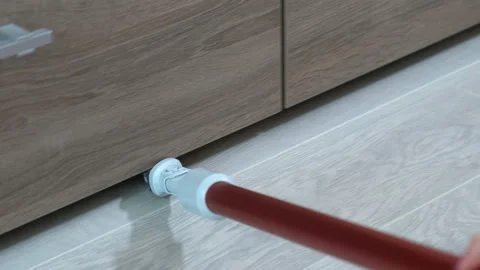 Clean the room with a vacuum cleaner Stockbeeldmateriaal 115368969