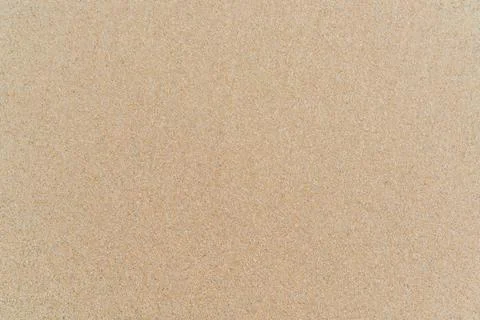 Clean sand pattern on the beach Stock Photos