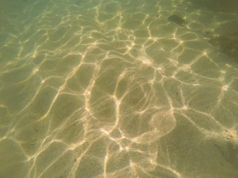 Clean sand on the seabed. Stock Photos