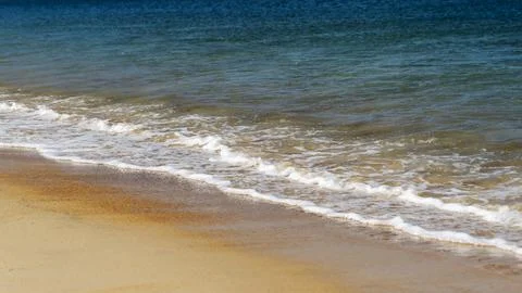 Clean sand on the seashore 스톡 사진