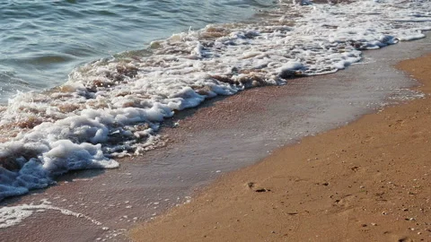 Clean sea waves breaking on sandy beach Stock Footage 157166762