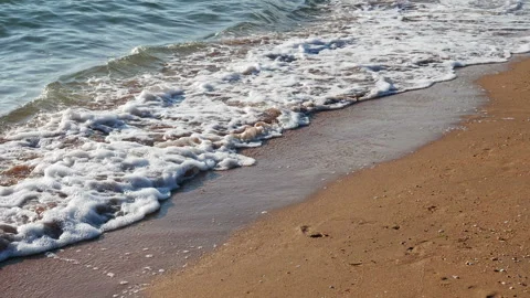Clean sea waves breaking on sandy beach Stock Footage 157167210