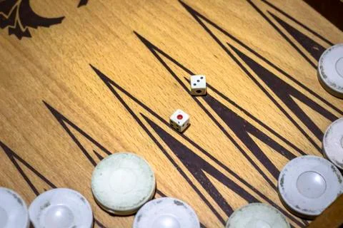 Clean shoot of dice of backgammon under dim light Stock Photos