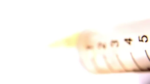 Clean shot of a syringe in use Stock Footage 64286211