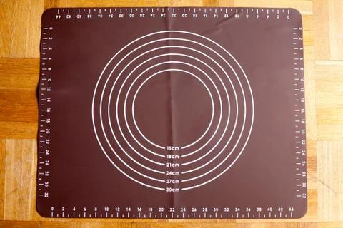 Clean silicon mat with scale marks for kneading dough Stock Photos