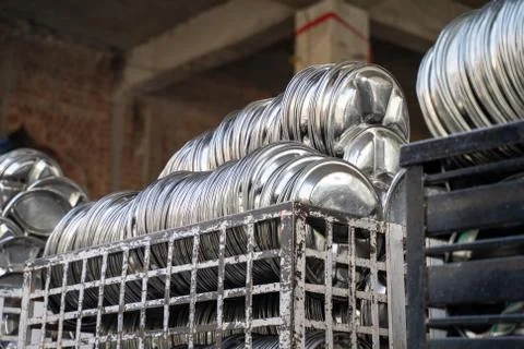 Clean silver dinner plates at the kitchen (Langar) Golden Temple in Amritsar, Stock Photos