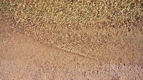 Clean stream water sand river. bright daytime top view, slow motion Stock Footage 219347553