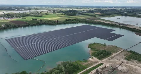 Clean sustainable energy generation using solar panels on a large pond in The Stock Footage 202169042
