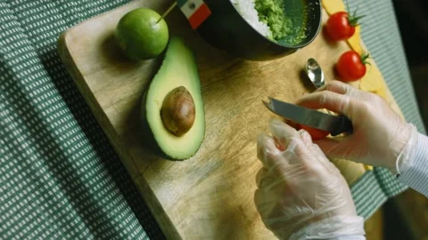 Clean the tomato on the wrong side Stock Footage 169349705