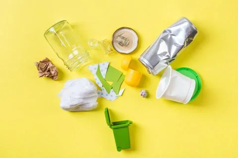 Clean trash to recycle in small bin metal, plastic paper and glass. Recycling Stock-Fotos