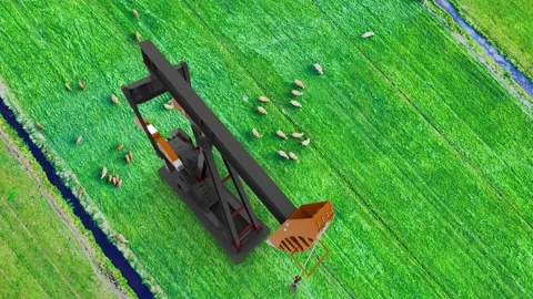 Clean vs dirty energy. Jack oil pump against grasslands. Sustainable develo.. 스톡 동영상 231470867
