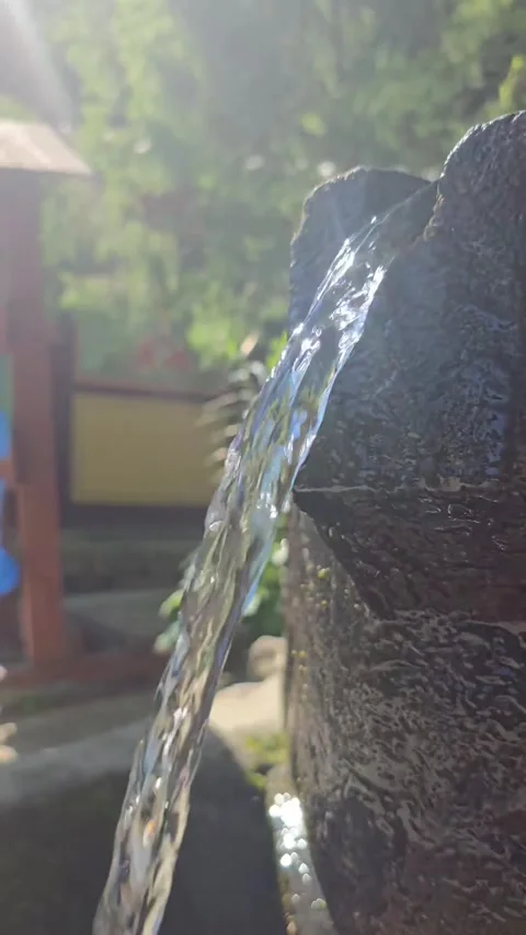 Clean Water Flowing Between Rocks in Natural Outdoor Setting Stock Footage 336346452