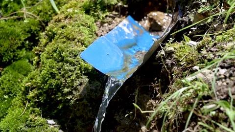 Clean water flowing from the mountain forest Stock Footage 155367765