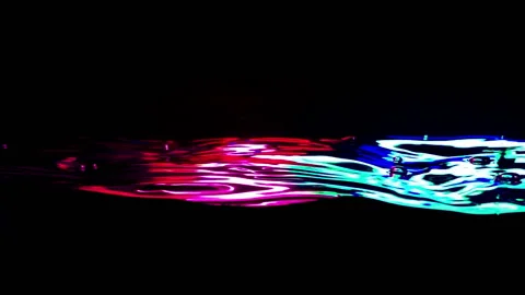 Clean Water line in slow motion Fills The Screen. Neon Colors Stock Footage 116881482
