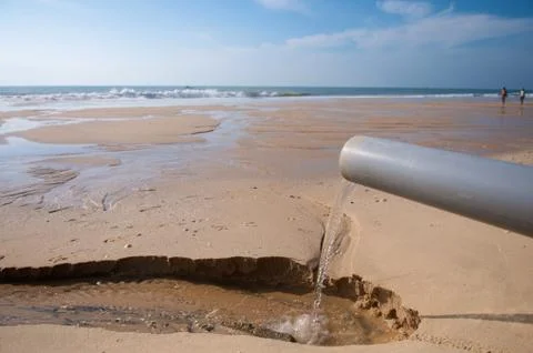 Clean water pipe at a beach Stock Photos