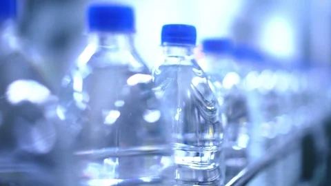 Clean water in plastic bottle moves through conveyor factory. Stock Footage 86196148