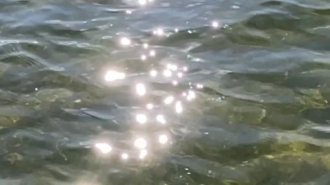 Clean water sun highlights throughout frame slo mo Stock Footage 167022166