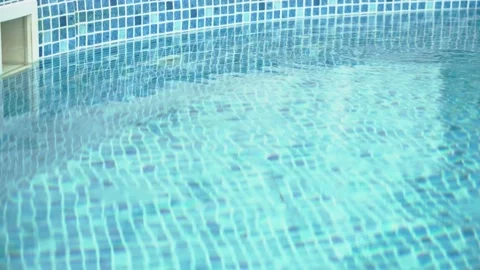 Clean water surface in the pool and bubbles from the working pump Stock Footage 161465992
