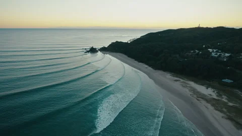 Clean Wave Lines Along Byron Bay Shore at Sunrise Stock Footage 327851332