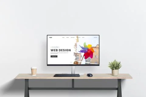 Clean web design workspace with computer display on desk Stock Photos