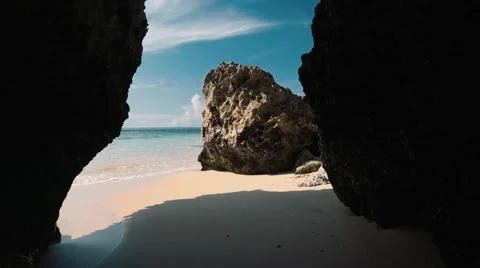 Clean white beach between cliffs - Geger beach, Bali 動画素材 63591372