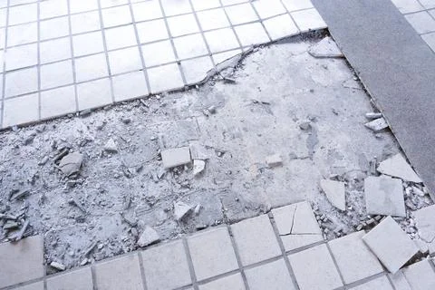 Clean white broken tile wall texture background.Tile floor exploded and crack Stock Photos