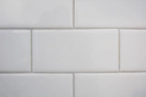 Clean white ceramic subway tile texture close up Foto stock