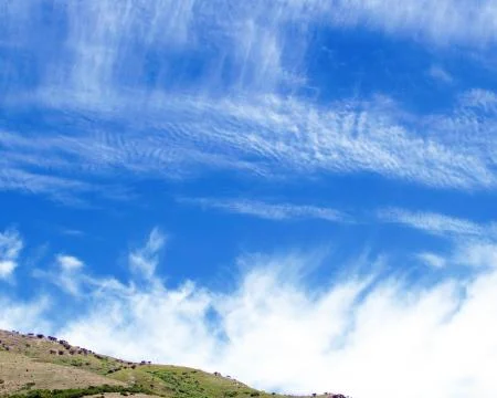 Clean White Clouds on Blue Sky Canvas Background 写真素材