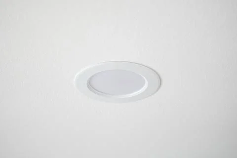 Clean white LED ceiling spotlight on the white wall Stock Photos