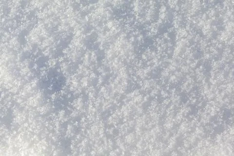 Clean, white snow close up. Winter background. Snow surface Stock Photos
