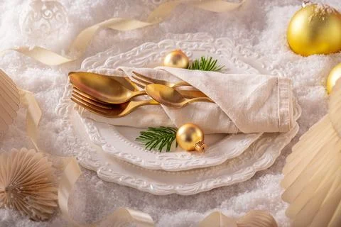 Clean white table setup with holiday decorations. Stock Photos