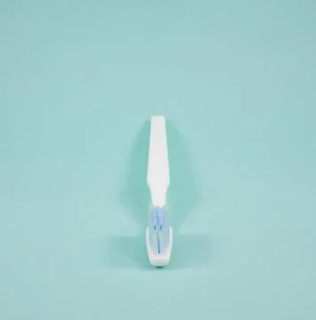 The clean white toothbrush Stock Photos