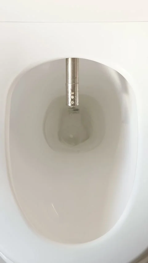 Clean White Urinal With Sensor Flush. Closeup Sequence Showing Automatic Flush 스톡 동영상 333800889