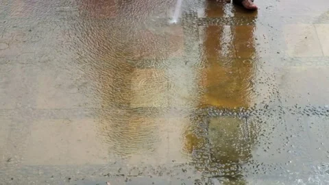Clean the yard floor with high pressure water spray Stock Footage 276222508